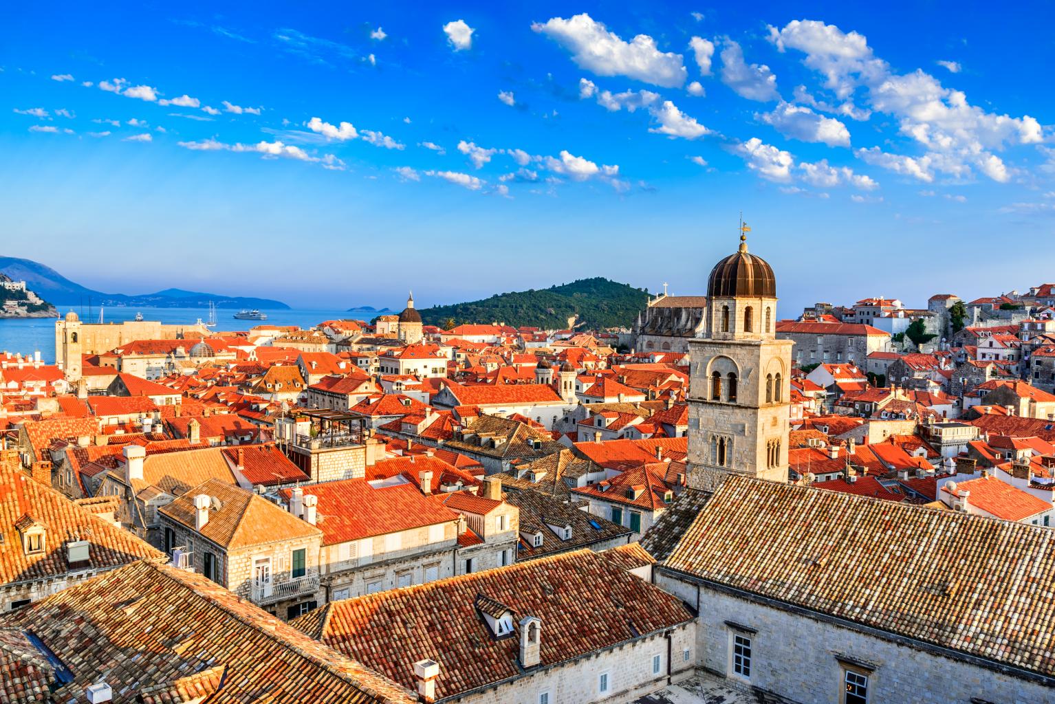 Dubrovnik, Croatia. Sunset golden light over Old Town roofs of Ragusa